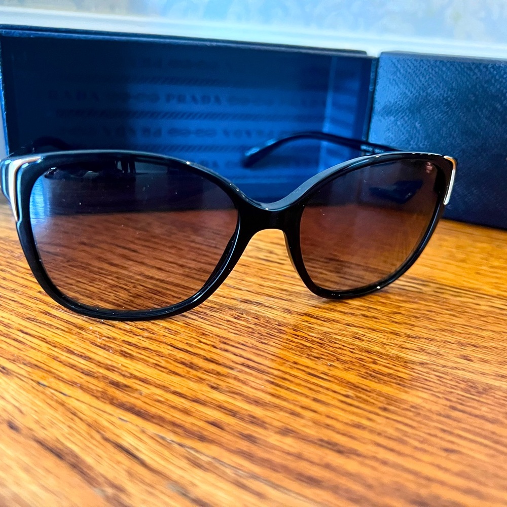 COPY - PRADA  SPR 01O 1AB-5W1 Black Sunglasses Gray Polarized Lens.